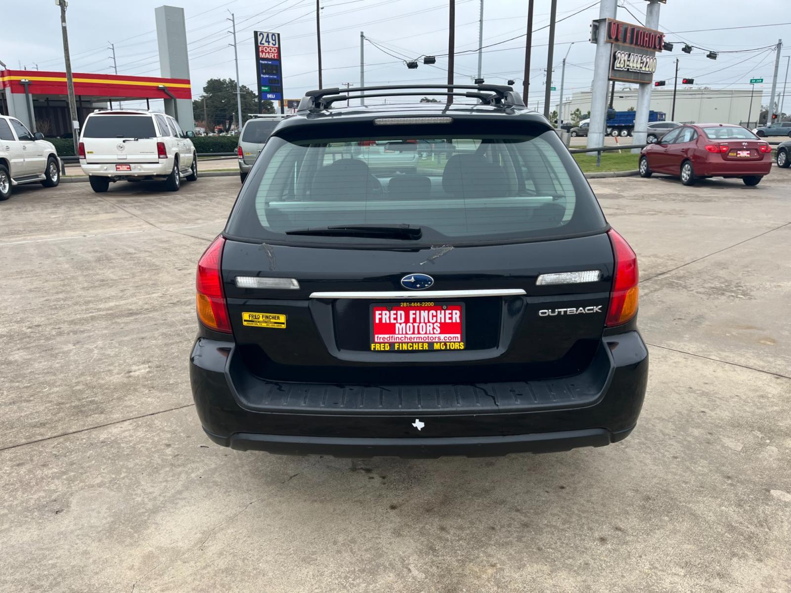 2005 Black Subaru Outback 2.5i Wagon (4S4BP61C757) with an 2.5L H4 SOHC 16V engine, 5-Speed Manual Overdrive transmission, located at 14700 Tomball Parkway 249, Houston, TX, 77086, (281) 444-2200, 29.928619, -95.504074 - Photo #5